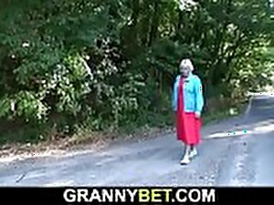 Hitchhiking superannuated light-complexioned granny
